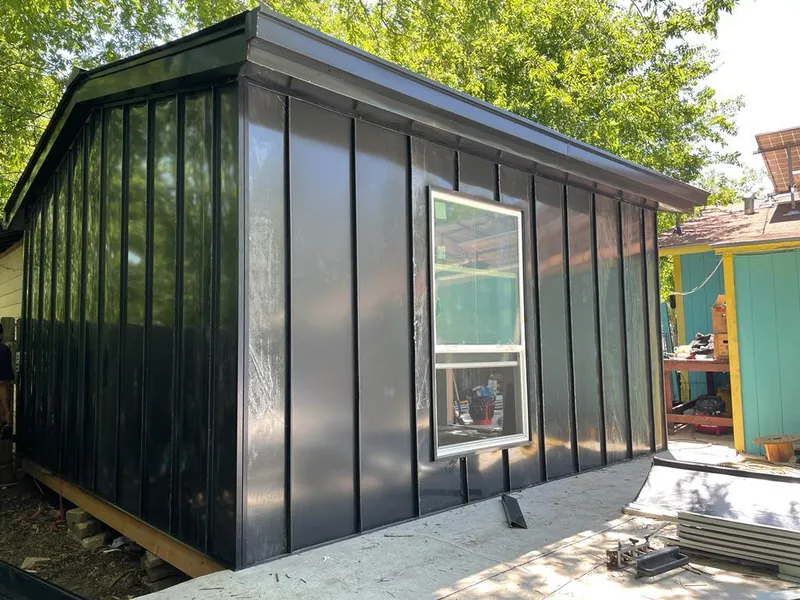 Black standing seam metal wall panels for Roof Inspection in Finneytown