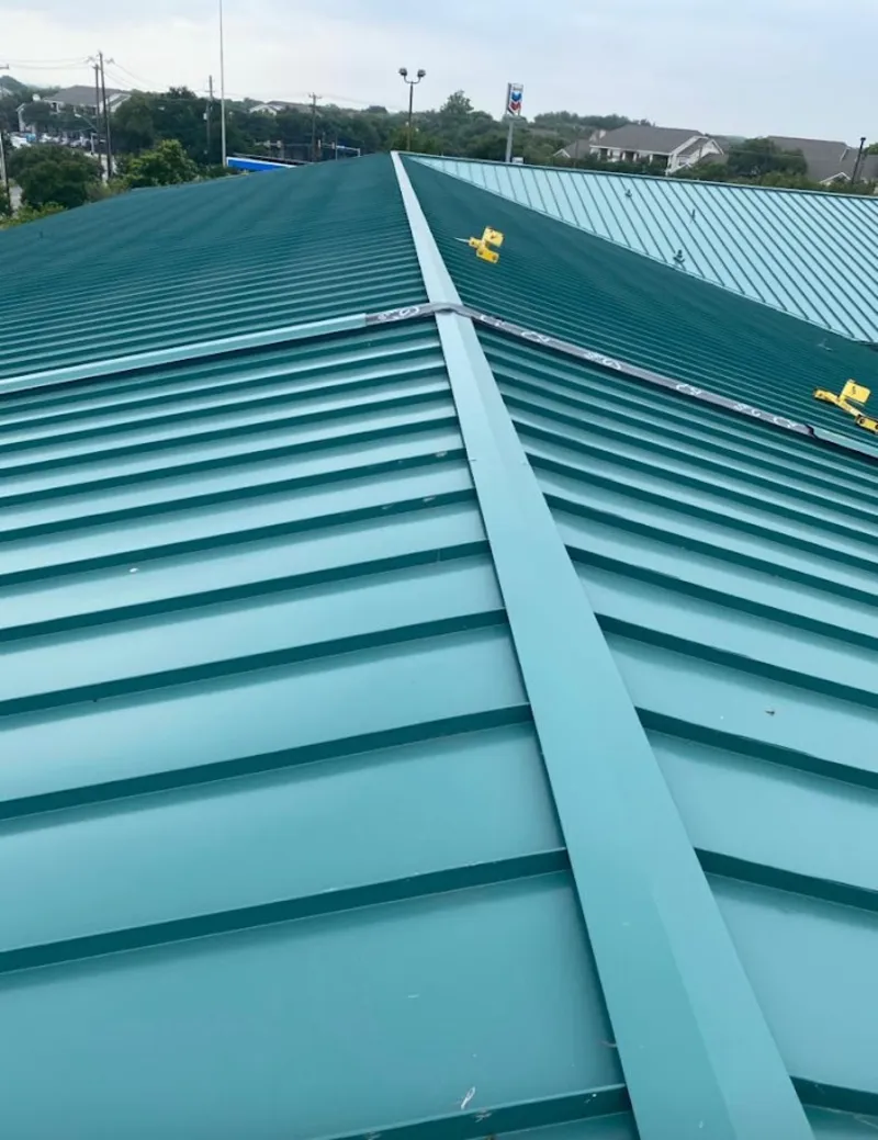 Green commercial metal roof ridge and valley for Metal Roof Repair in Finneytown