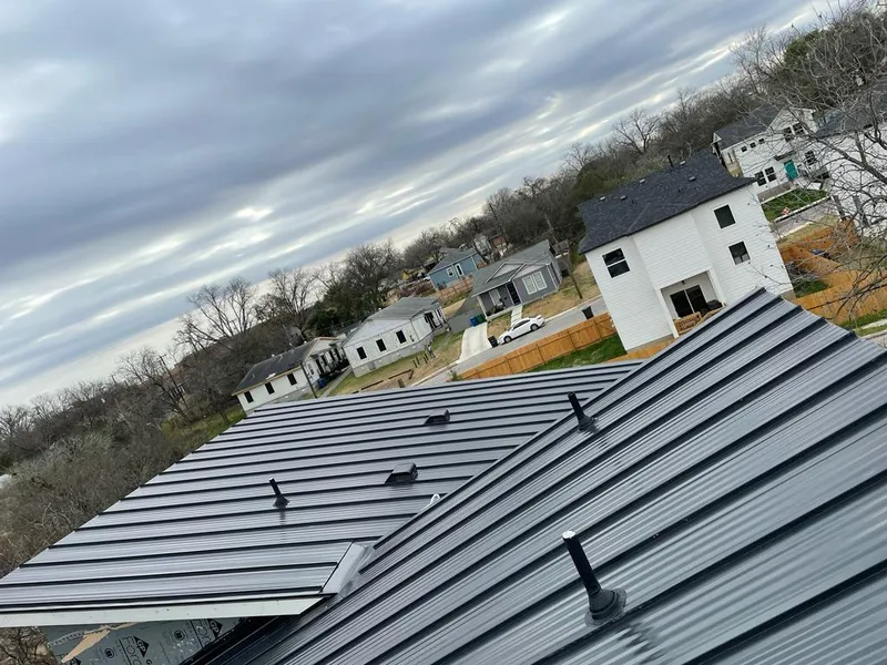 Standing seam metal roof panels with vents for Skylight Repair in Finneytown